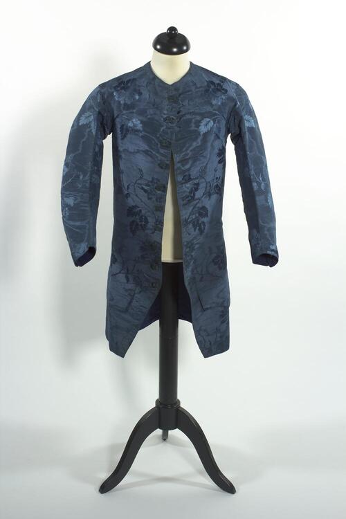 Blauw zijden herenvest of kamisool met lichtblauw bladmotief