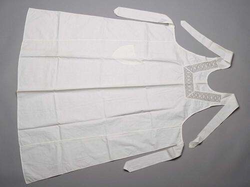 Werkschort met broderie en ronde zak