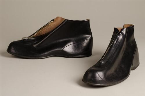 Paar heren overschoenen met rits