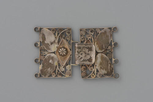 Netteslotje of mantelineslotje, Zuid-Beveland, 1865–1875