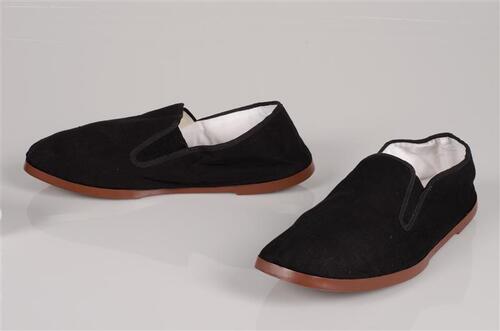 Paar herenschoenen behorend bij ensemble