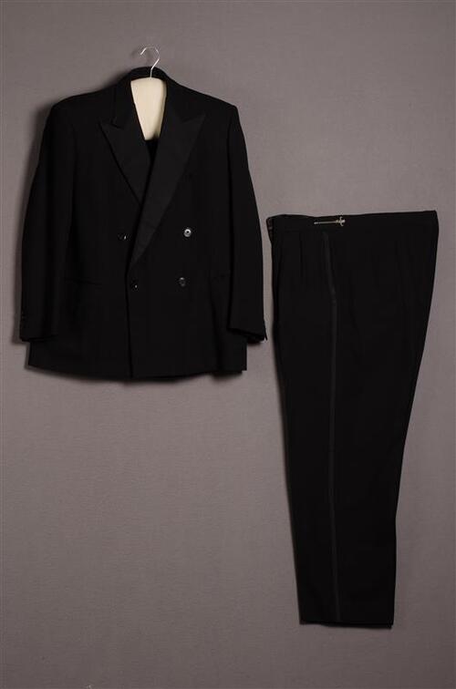 Tweedelig herenensemble bestaande uit jas en broek (smoking)