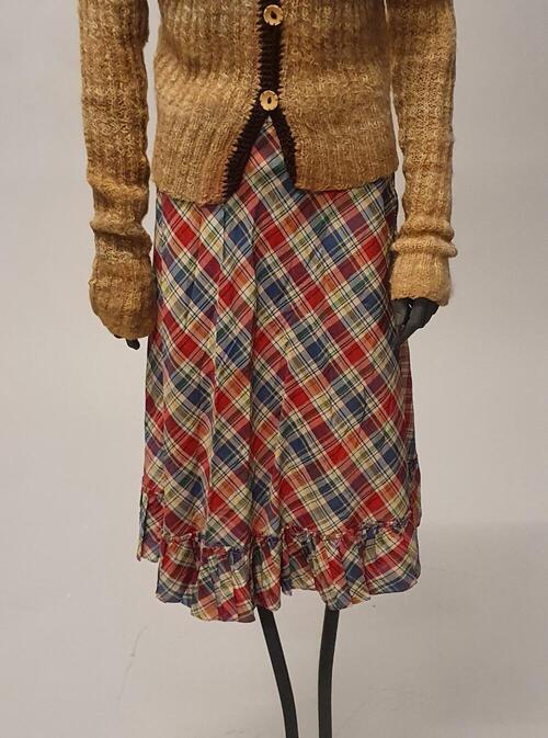 Rok van kunstzijde in rood, blauw, wit, groen en gele ruit (tartan), halflang, gerend model met…