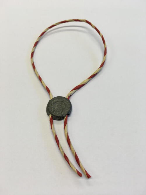 Armband van gedraaid papier en lood