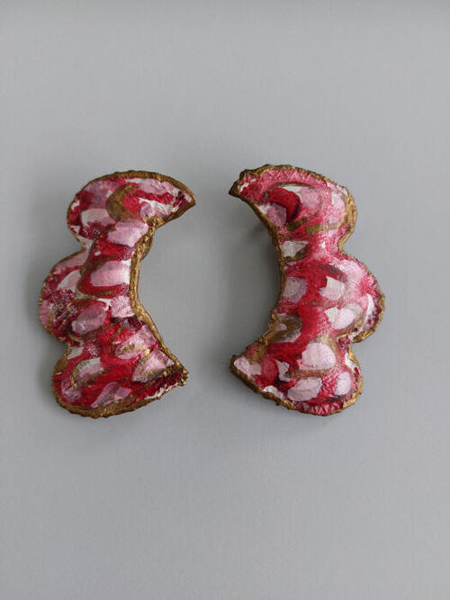 Oorsieraad in goud en roze