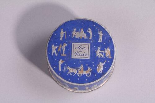 Blauwe poederdoos in karton met figuren in zilver- en goudkleuren
