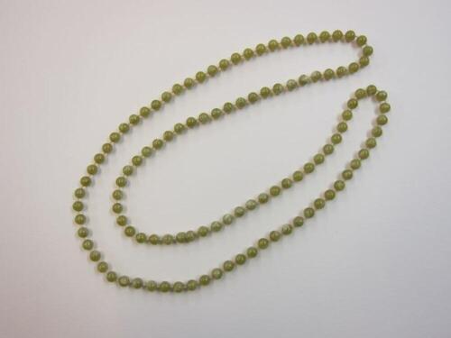 Halsketting in groene plastic kralen