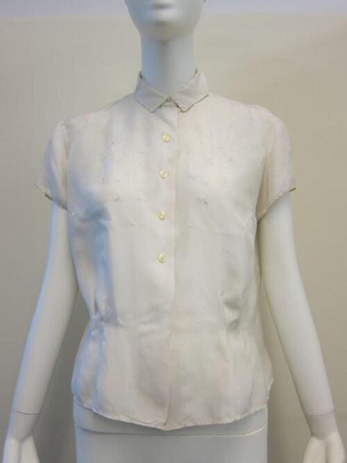 Blouse in ecru zijde
