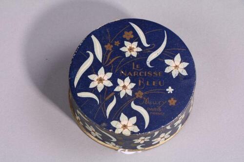 Blauwe poederdoos in karton met witte bloembedrukking