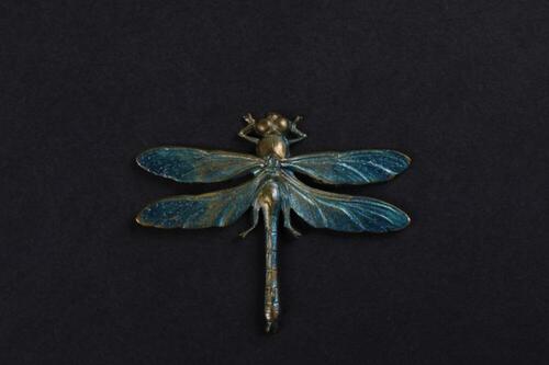 Broche in koper in de vorm van een libelle