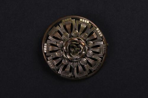 Ronde broche in koper