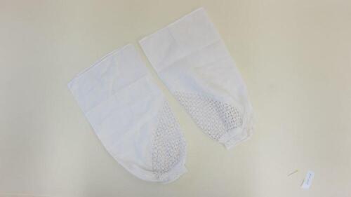 Mouwen in wit katoen versierd met broderie anglaise