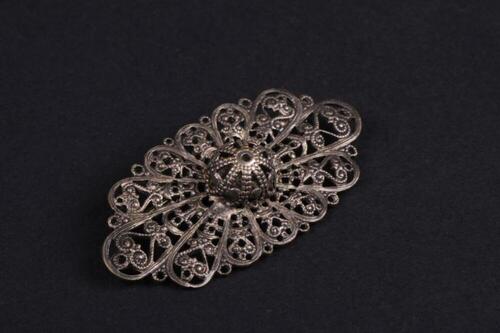 Ovale ornamentele broche in metaal