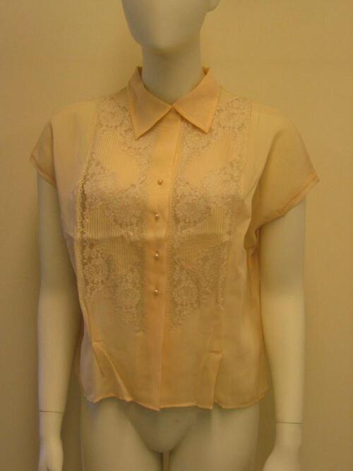 Blouse in gele nylon en kant