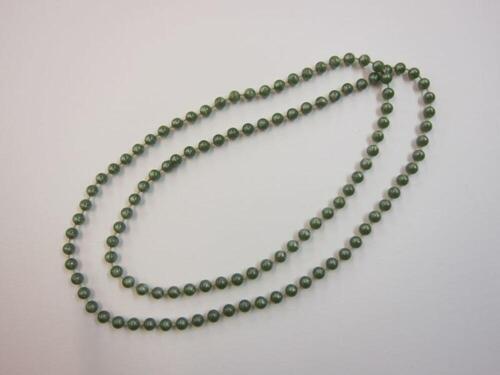 Halsketting met groene plastic kralen