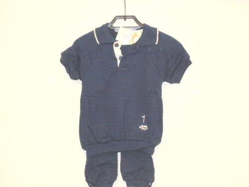 Ensemble in donkerblauw tricot bestaande uit broek en trui