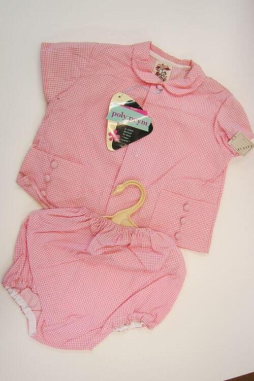 Ensemble in roze bestaande uit blouse en broek