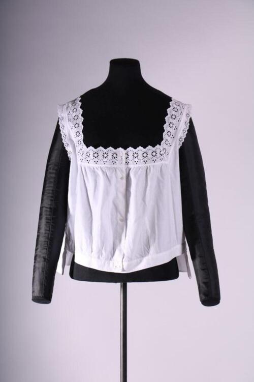Cache-corset in wit katoen met sierlint
