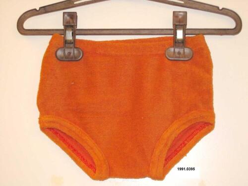 Broek in oranje badstof