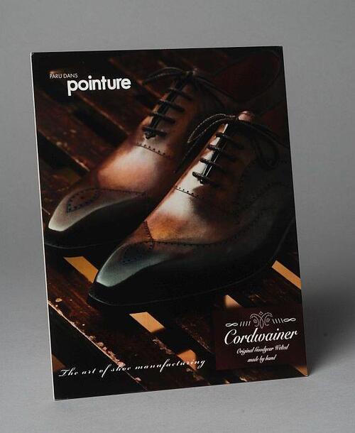 Reclamebord met "CORDWAINER"