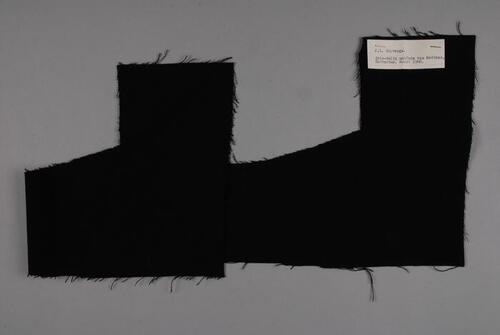 Stofstaal van zwart keper voor uniformen voor suppoosten Historisch Museum, 1960