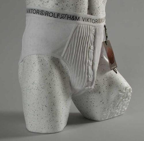 Onderbroek, heupslip van wit tricot katoen met platte plooitjes en knoopsluiting op de gulp,…