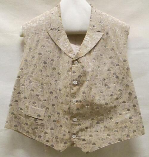 Vest (man) van beige gebrocheerde ripszijde met grijze figuurtjes, achterpand en voering van witte…