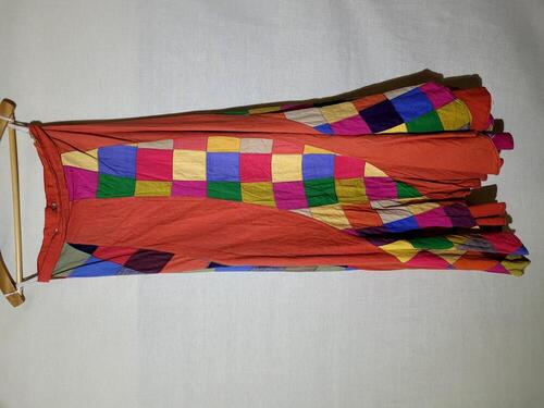 Rok, maxirok of hippierok van oranjerode Indiakatoen en veelkleurig Indiakatoen in patchwork