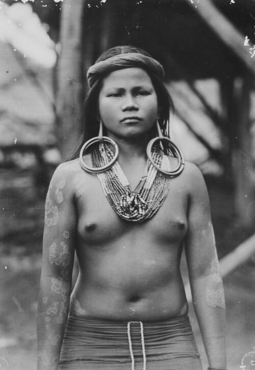 Portrait of Dewong Kehad, a childless 24 years old Kayan-Dayak Woman from the Upper-Mahakam region…