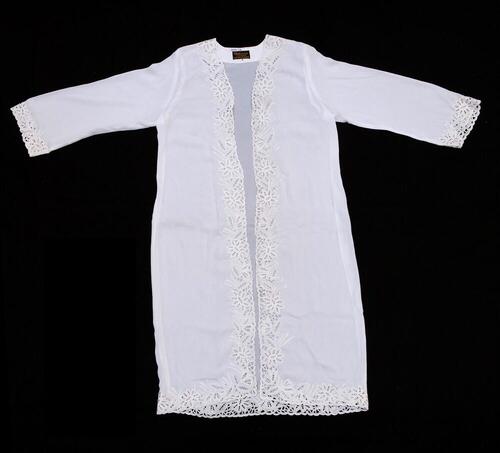 Coat, part of a costume for a Muslim woman who has made the pilgrimage to Mecca
