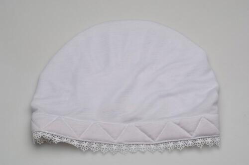 Cap, part of a costume for a Muslim woman who has made the pilgrimage to Mecca