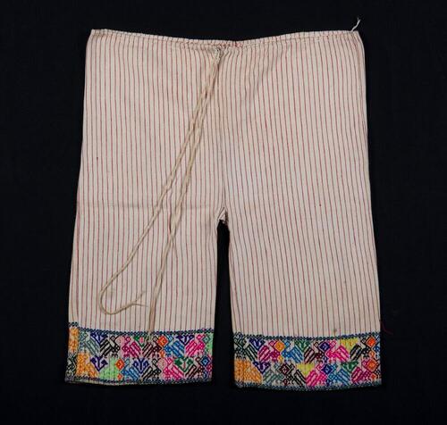 Kinderbroek met vogel- en plantmotieven