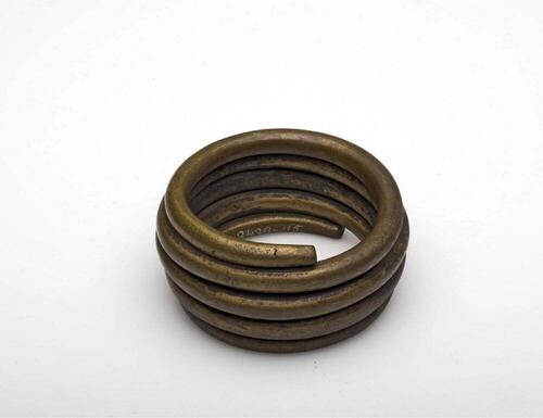 Koperen armband, in spiraalvorm gewonden