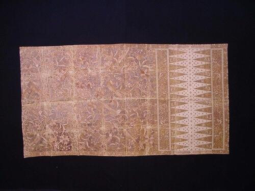 Doek met was bedekt