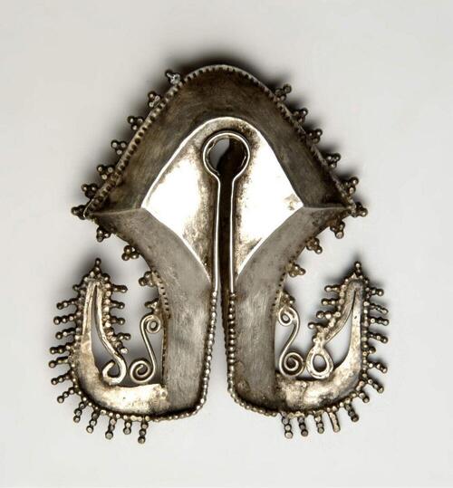 Silver ear ornament