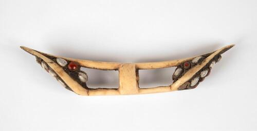 Nose ornament of carved bone