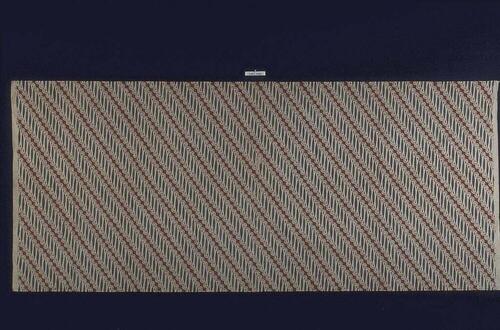 Wikkelrok met achtergrondpatroon van bekend geometrisch motief