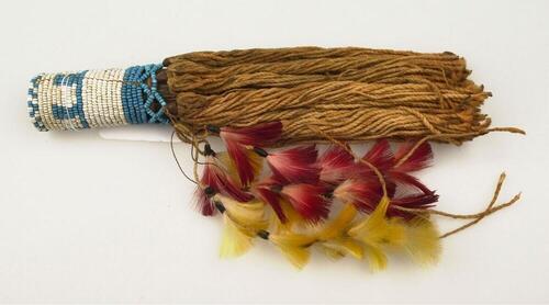 Bamboo hair cylinder with beads, strings and feathers