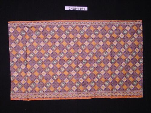 Doek van imitatie batik met dierfiguren in ruiten