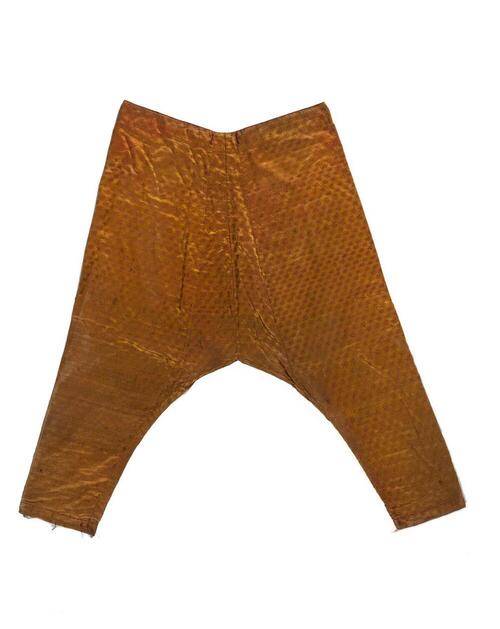 Broek, onderdeel van pasangingang