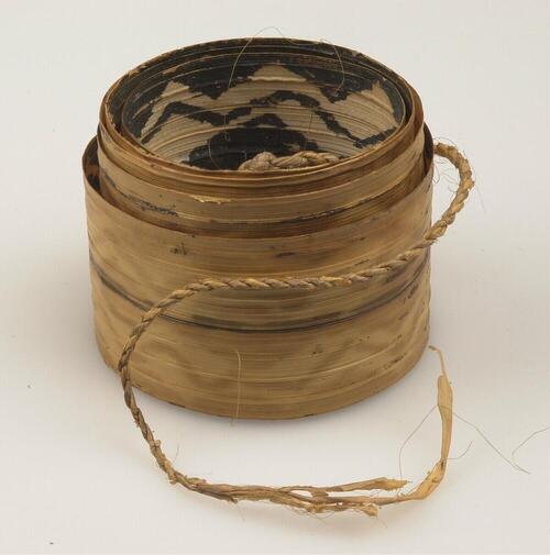 Upper arm decoration made of palm leaf