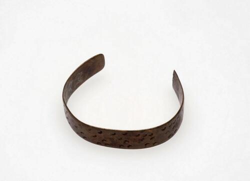 Koperen beenband
