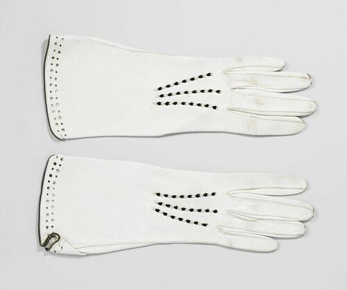 Pair of gloves with embroidered seams