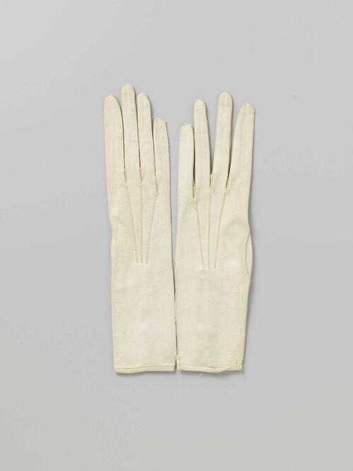 Two pairs of gloves with buttons