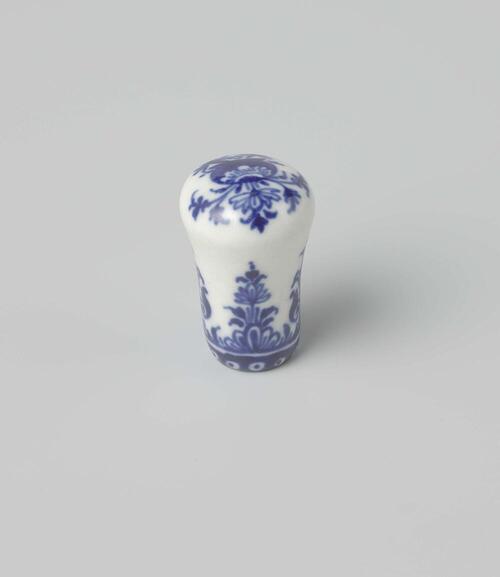 Cane knob with a flower vase and floral scrolls